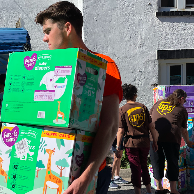 Man carrying diapers